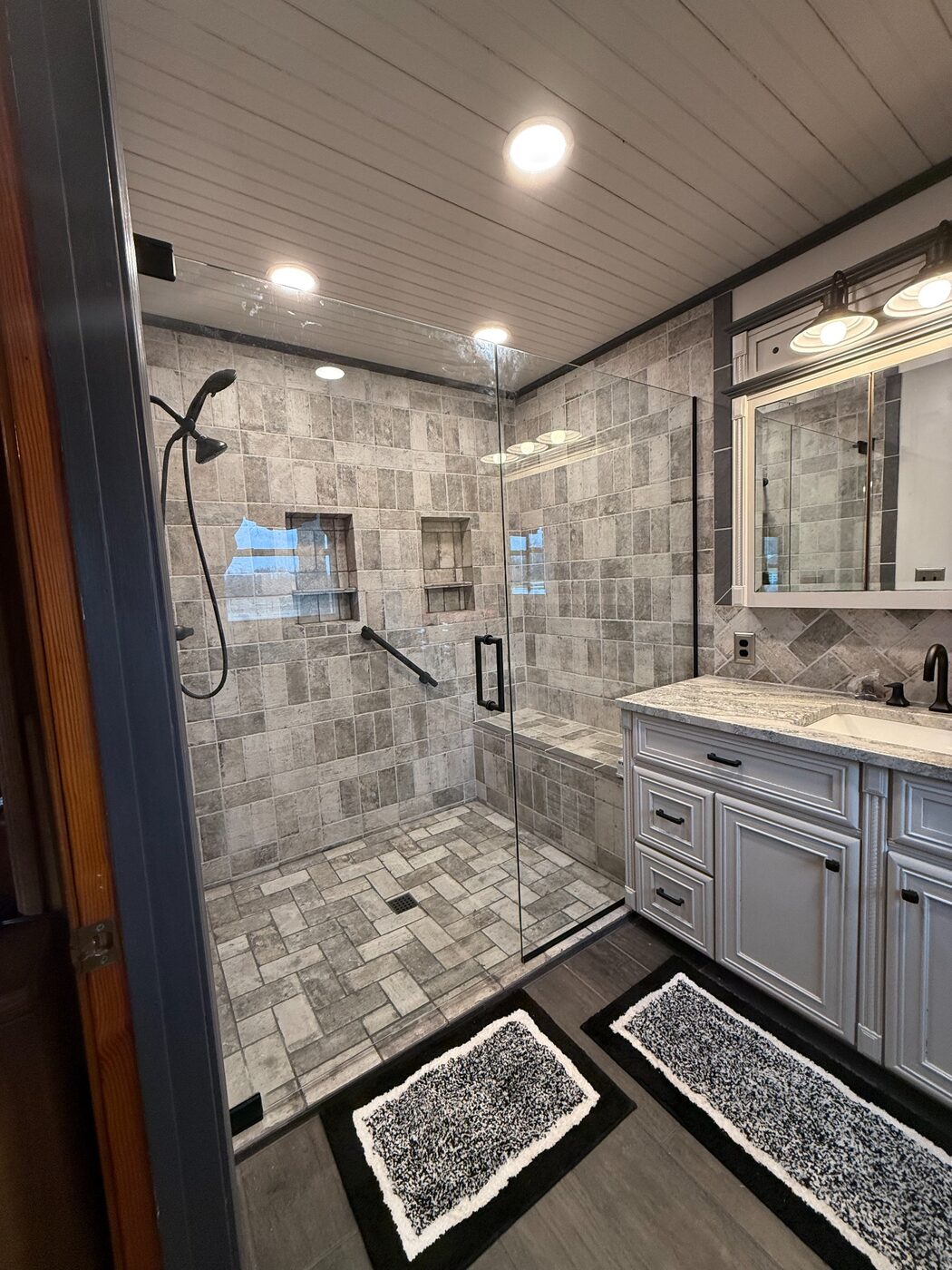 Large frameless glass shower enclosure