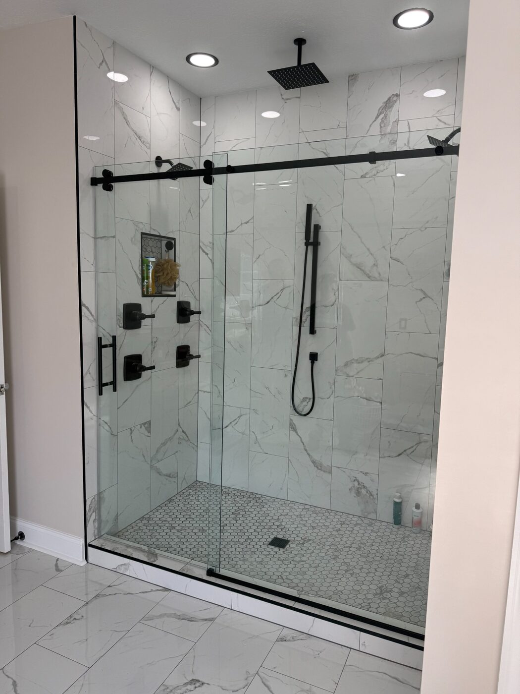 Double sliding frameless shower door